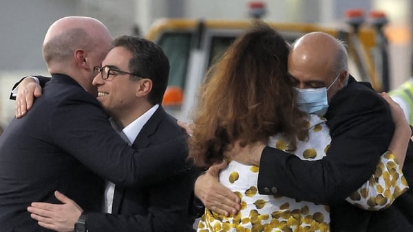 US citizens Siamak Namazi (2L) and Morad Tahbaz (R) were welcomed by US officials in Qatar