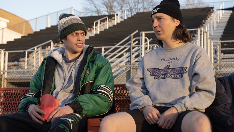 Petr Davidson and Paul Dano in Dumb Money