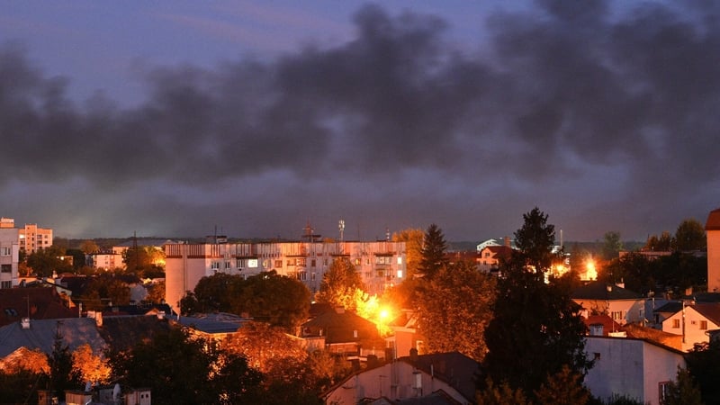 Black smoke billows over the city after drone strikes in the western Ukrainian city of Lviv