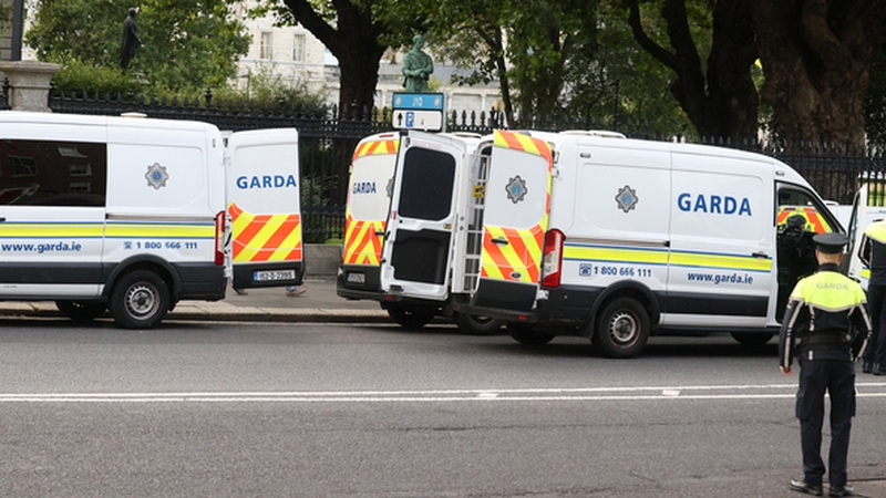 Garda vans waiting near Government Buildings