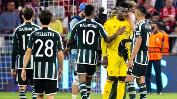 Andre Onana's Manchester United team-mates console him after the final whistle