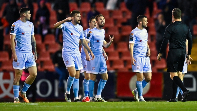 Derry City players protest to referee Robert Harvey after Stefan Radosavljevic's goal is allowed to stand