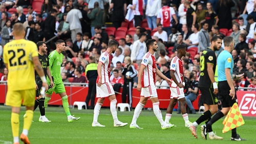 Players were taken off the field in Amsterdam after a third interruption related to fireworks