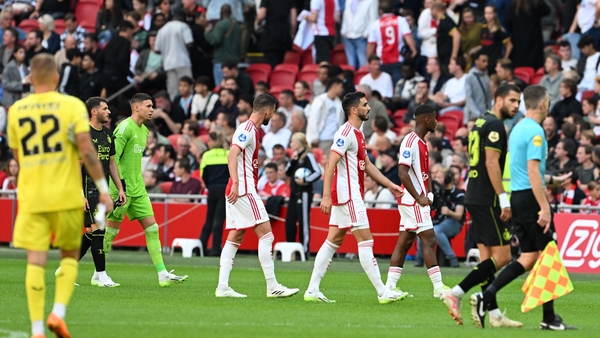 Players were taken off the field in Amsterdam after a third interruption related to fireworks