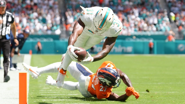 Raheem Mostert dives over for another touchdown in rout of Denver