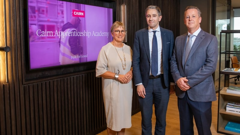 Julie Sinnamon, Non-Executive Director of Cairn, with Simon Harris, Minister for Further and Higher Education, Research, Innovation and Science and Michael Stanley, CEO of Cairn Homes