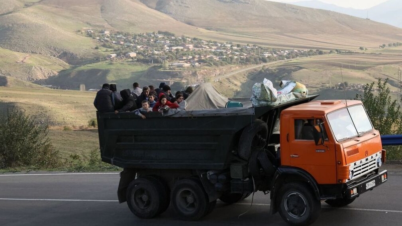 A truck with refugees on the road between Kornidzor and Goris on September 28th 2023 as more than 65,000 Armenians flee Nagorno-Karabakh after it was claimed by Azerbaijan. Photo: Getty Images