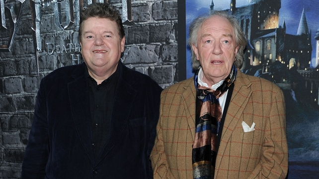 Robbie Coltrane and Michael Gambon at the grand opening of Harry Potter: The Exhibition at Discovery Times Square Exposition Center on 4 April, 2011 in New York