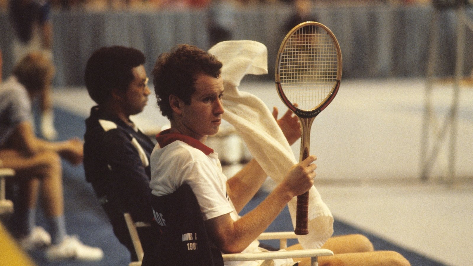John McEnroe with captain Arthur Ashe on the way to the US winning the 1981 Davis Cup final against Argentina who would knock the Americans out early two years later