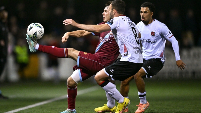 Dayle Rooney of Drogheda in action against Robbie Benson and Sam Durrant of Dundalk