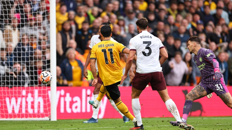 Hwang Hee-Chan of Wolverhampton Wanderers scores