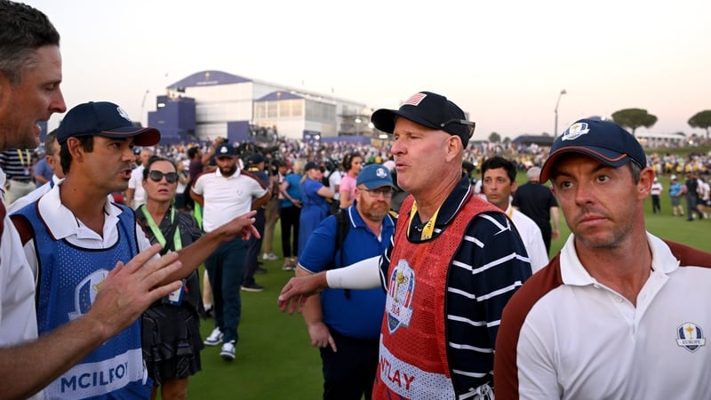 Joe LaCava gets into it with Justin Rose after the match