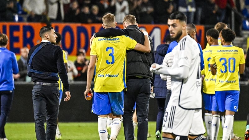 Dario van den Buijs of RKC Waalwijk is consoled after the incident