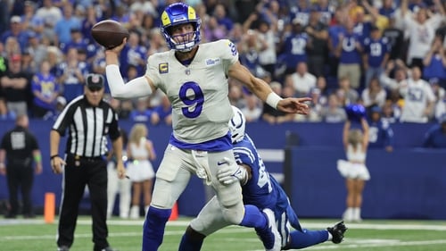 Matthew Stafford of the Los Angeles Rams throws under pressure from EJ Speed