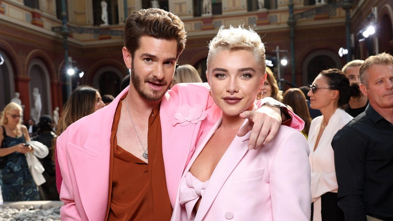 Andrew Garfield and Florence Pugh at the Valentino catwalk show at Paris Fashion Week. Getty Images