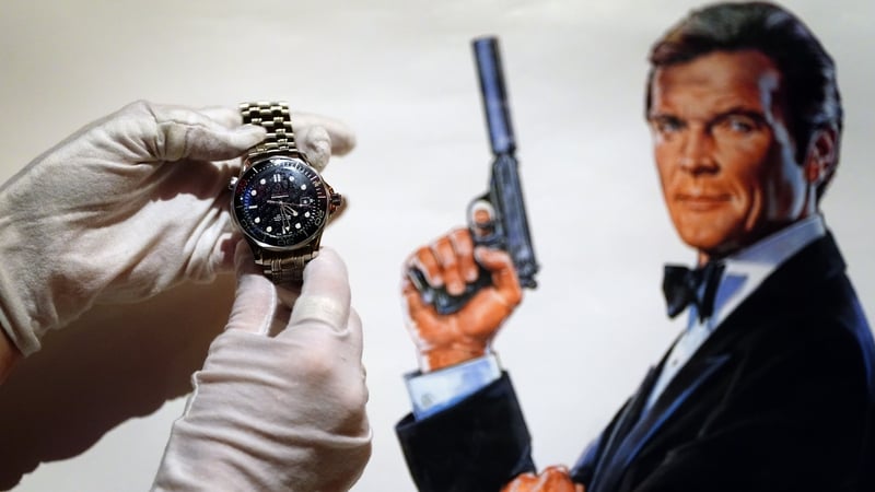 A watch, with the inscription 'To Roger love from Michael and Barbara' is among the items up for sale