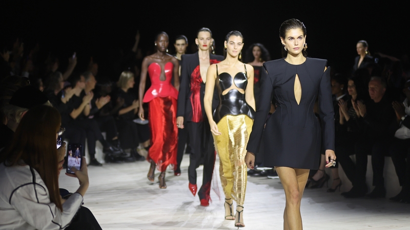 Kaia Gerber walks the runway at the Alexander McQueen SS24 show during Paris Fashion Week. Getty Images