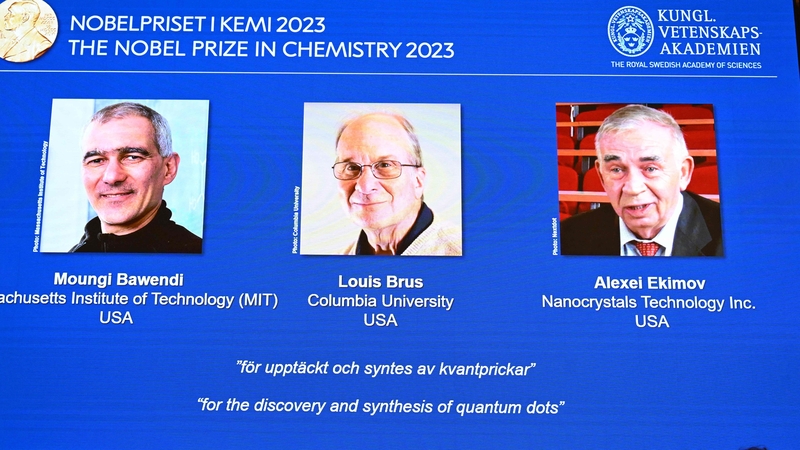 A screen shows this year's laureates during the announcement of the winners in Stockholm