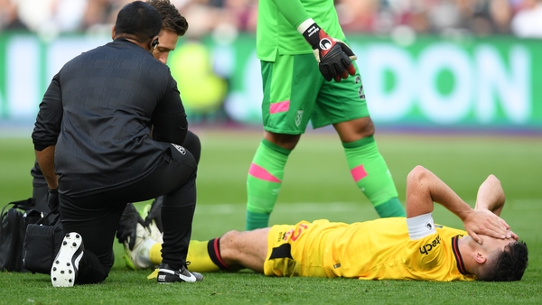 John Egan receives medical treatment at London Stadium