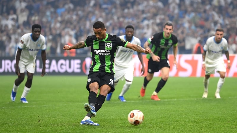 Joao Pedro of Brighton & Hove Albion scores the team's second goal from a penalty