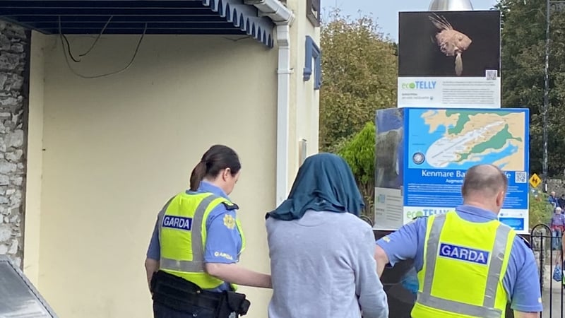 Patrick Murphy is led away at Kenmare District Court after being charged with the murder of Joe Brosnan