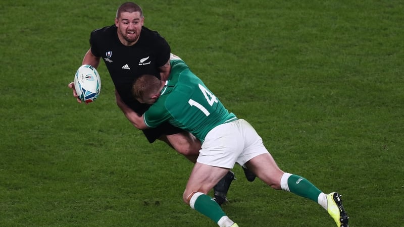 Dane Coles gets the offload away despite the best efforts of Ireland winger Keith Earls during the 2019 Rugby World Cup quarter-final