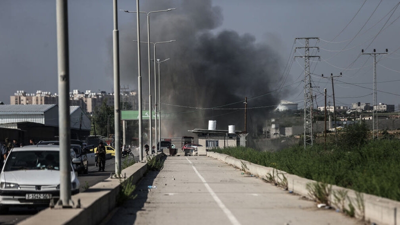 Smoke rises as the clashes between Palestinian groups and Israeli forces continue on the streets of Beit Hanoun, Gaza