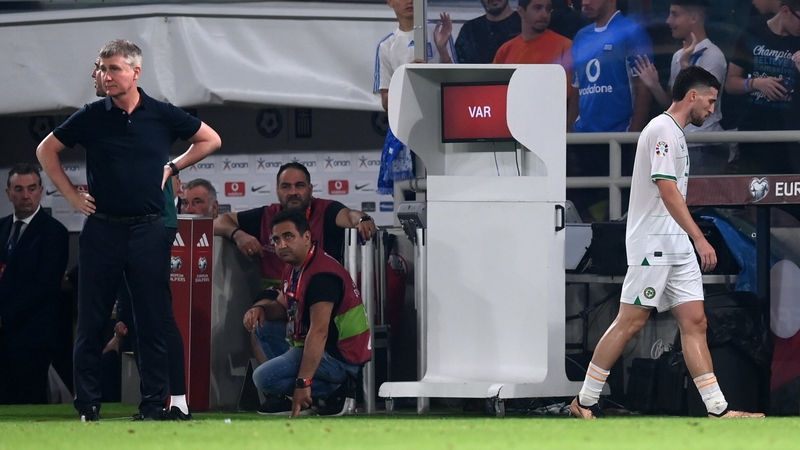 Matt Doherty walks off the pitch in Athens following his red card