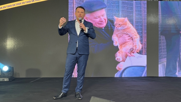 Slawomir Mentzen speaks on stage at the Koneser Center in Warsaw last weekend.