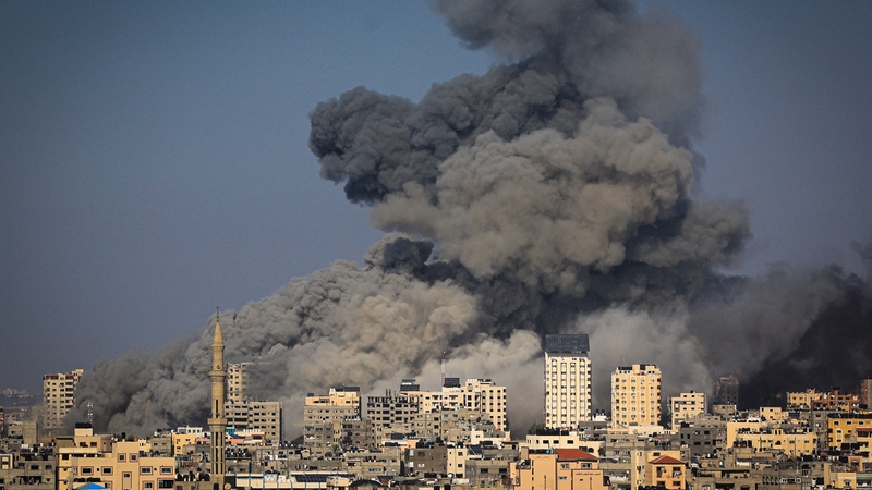 Smoke billows during Israeli air strikes in Gaza City