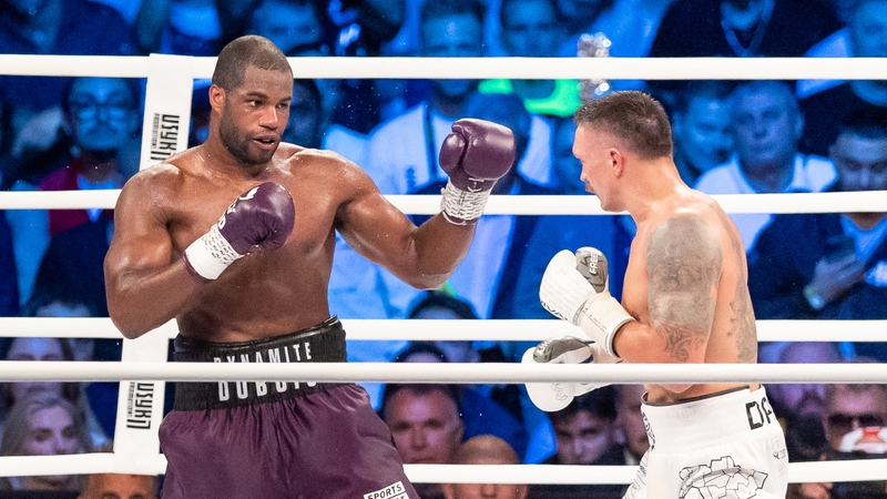 Daniel Dubois (L) in action against Oleksandr Usyk