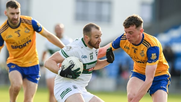 Benny Carroll of Portlaoise in action against Michael Dempsey of St Joseph's