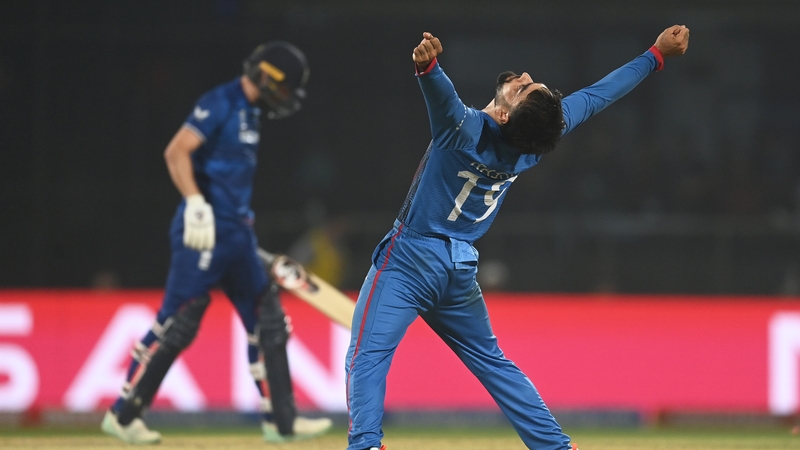 Afghanistan's Rashid Khan celebrates the wicket of Mark Wood