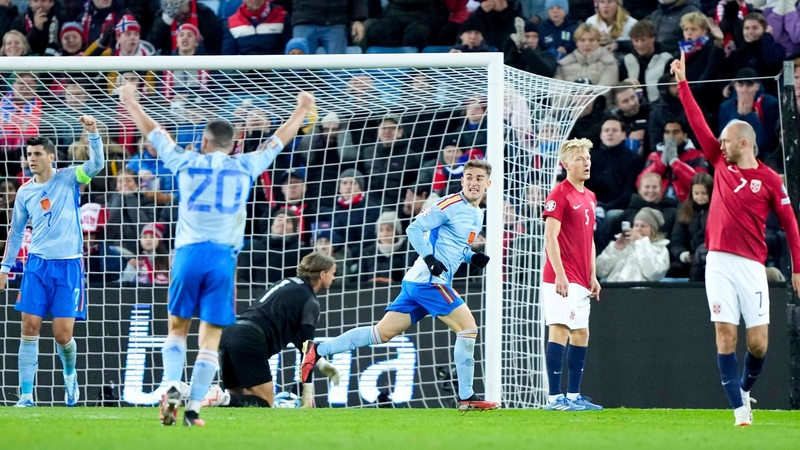 Gavi (C) celebrates scoring the opening goal