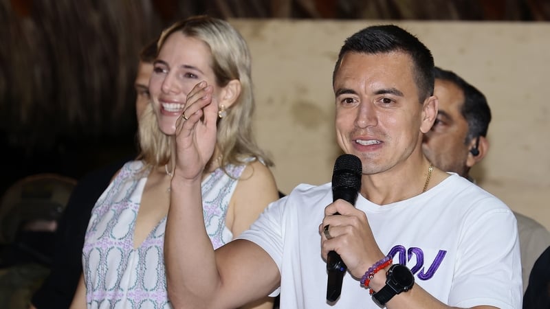 Daniel Noboa, with his his wife Lavinia Valbonesi, speaks to supporters in Olon