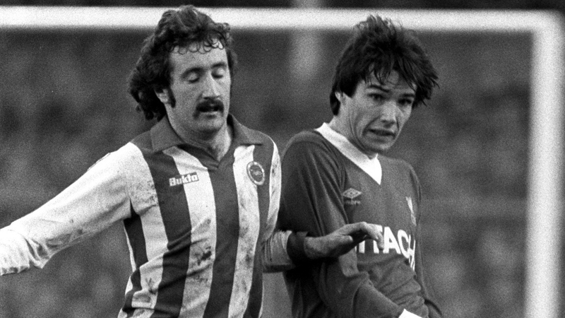 Gerry Ryan (L) in action for Brighton against Liverpool's Alan Hansen in 1979