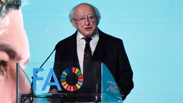 President Michael Higgins delivering a speech at the event in Italy
