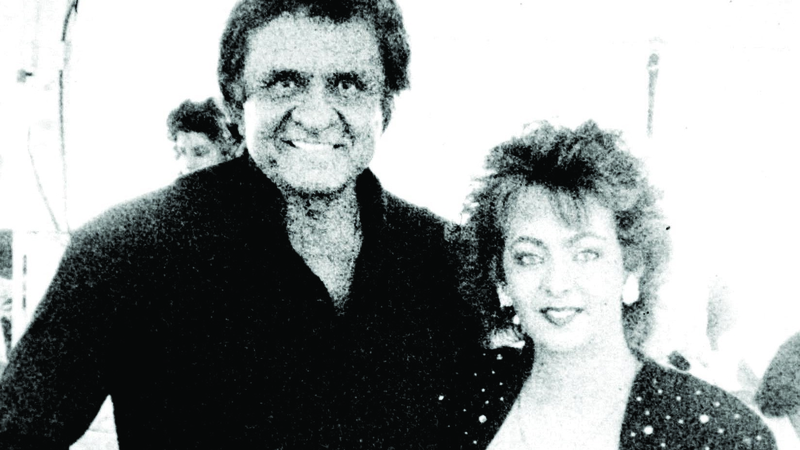 Sandy Kelly, with country music legend Johnny Cash (Pic: James Connolly)
