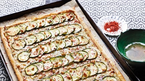 This tasty puff pastry tart comes with a creamy but tangy filling.