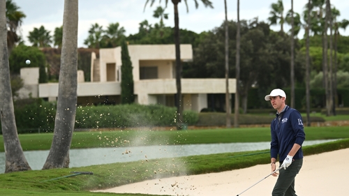 Tom McKibbin plays out of the sand on 13 - a hole that led to a double bogey