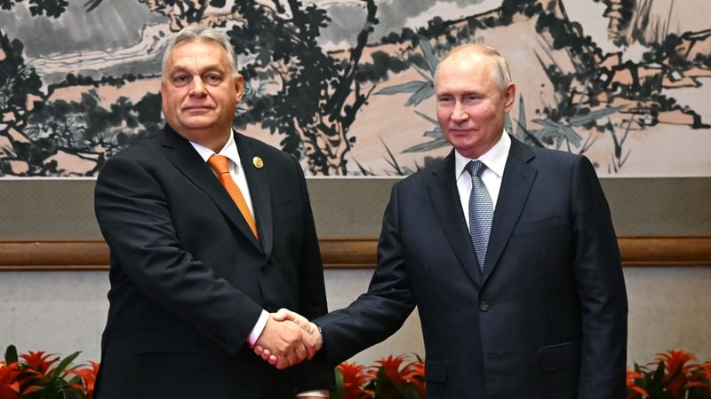 Viktor Orban shakes hands with Vladimir Putin in Beijing earlier this week