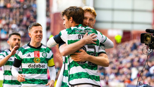 Matt O'Riley celebrates his goal with Ireland international Liam Scales