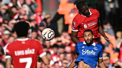 Konate jumps above Everton's Dominic Calvert-Lewin during the Merseyside derby