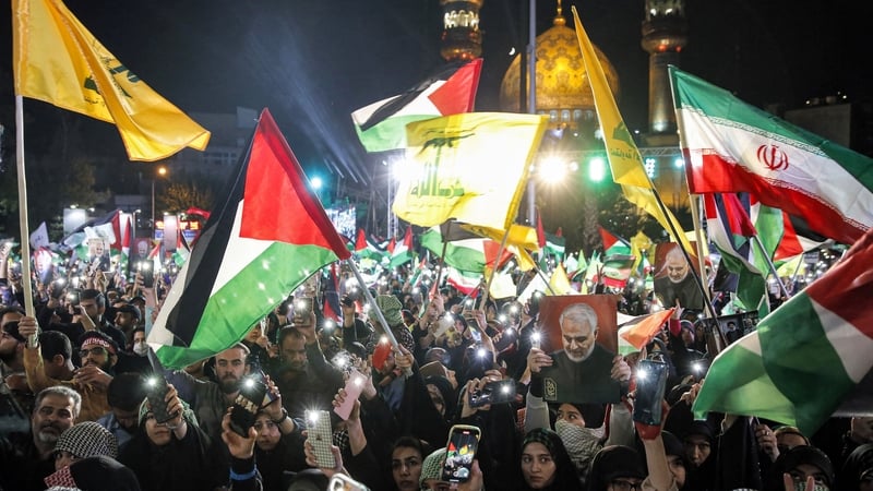 Demonstrators with Iranian, Palestinian and Hezbollah flags during a protest in Tehran in support of Palestinians in the Gaza Strip on October 20th 2023. Photo: AFP