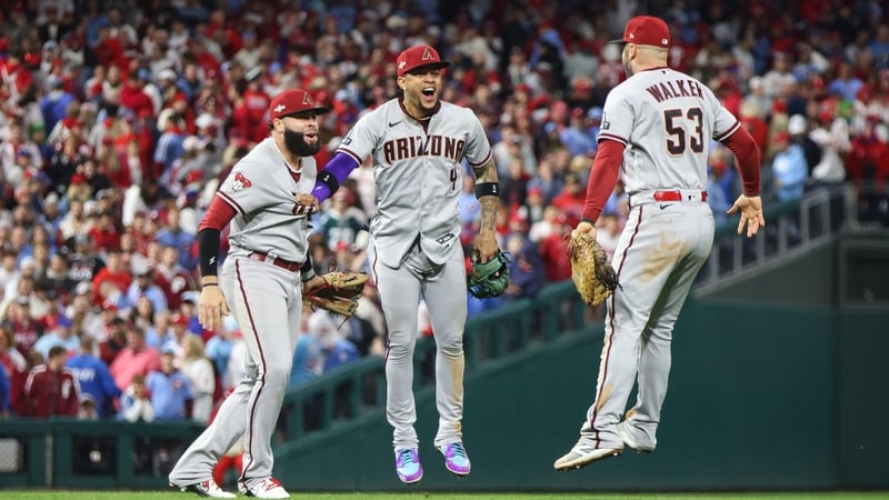 Emmanuel Rivera, Ketel Marte and Christian Walker celebrate as the Arizona Diamondbacks seal their spot in the World Series