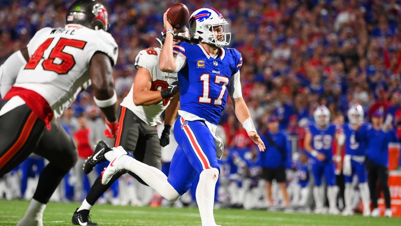 Josh Allen #17 of the Buffalo Bills carries the ball for a touchdown