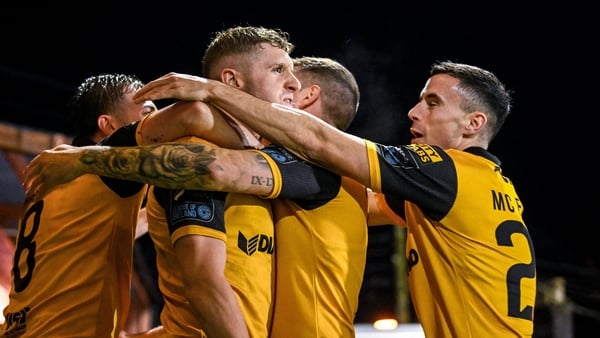 Ronan Boyce of Derry City, centre, celebrates with team-mates after scoring his goal against Cork City