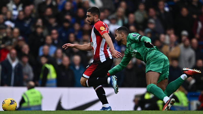 Neal Maupay skips past stranded Chelsea keeper Robert Sanchez in the lead-up to Brentford's clincher