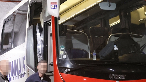 The Lyon coach was attacked with stones