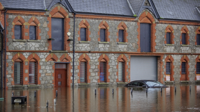 A car is submerged under water at Basin Walk Car Park
